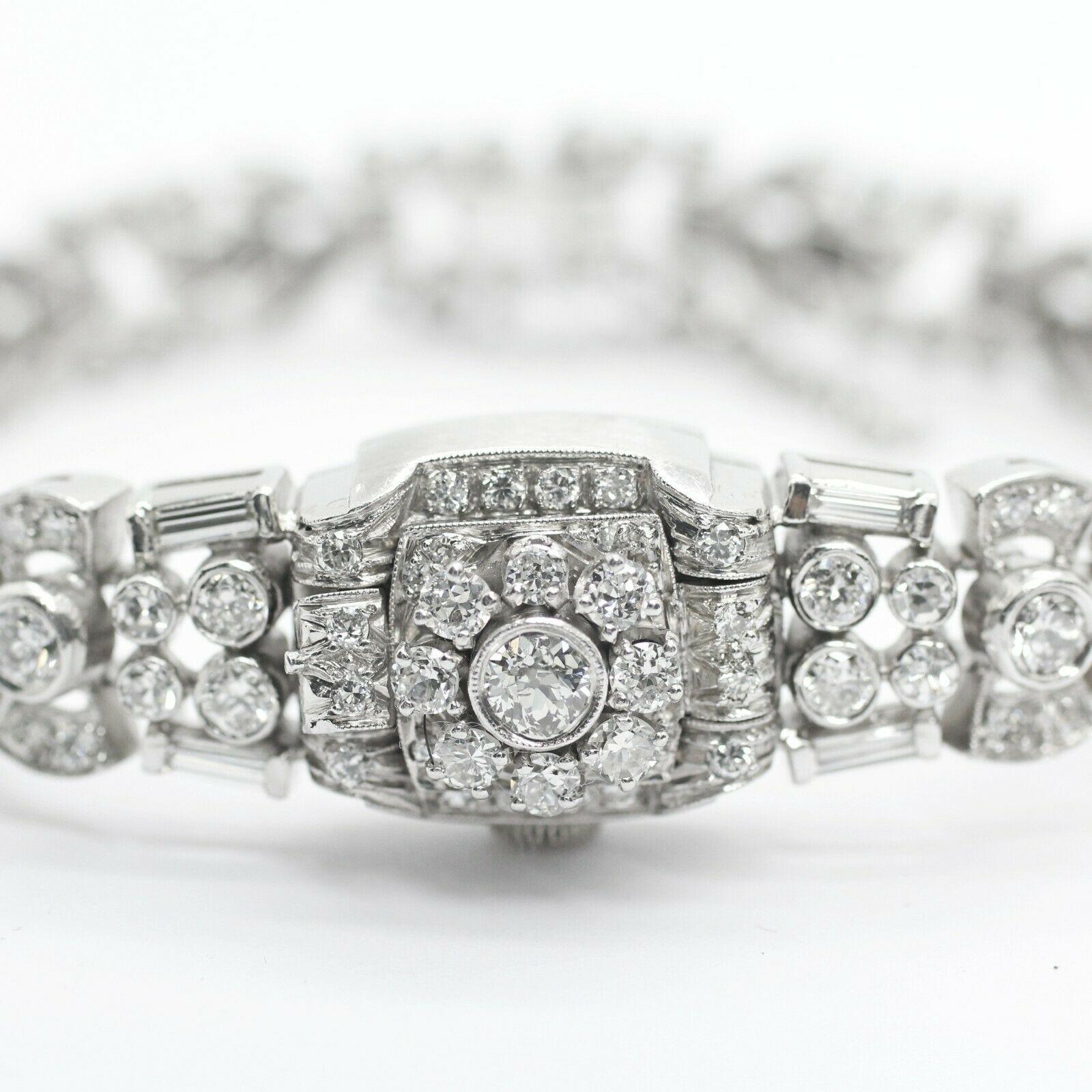 Art Deco Style platinum diamond watch-bracelet
Specifications:
    main stone: ROUND CUT DIAMONDS
    diamonds: 165 PIECES
    carat total weight: APPROX 4.50 CTw
    color: H-I
    clarity: SI1-si2
    brand: UNBRANDED
    metal: PLATINUM
    type: