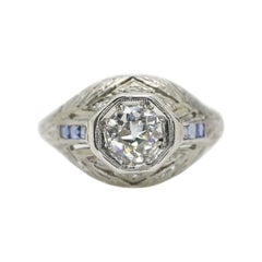 Art Deco Style Platinum Diamond with Sapphire Accents on a Ring
