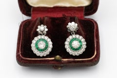 Art Deco platinum earrings with emeralds and 1.80ct diamonds