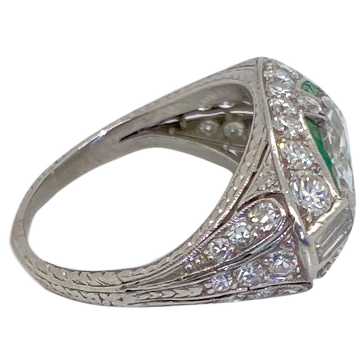 Art Deco Platinum East West Marquise Cut Diamond and Emerald Ring 1
