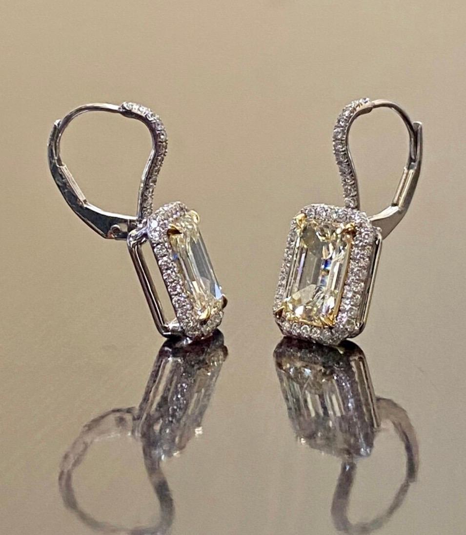 DeKara Designs Collection

Metal- 95% Platinum, 5% Iridium, 18K Yellow Gold.

Stones- 2 Genuine Emerald Cut Diamonds X Color VS2-SI1 Clarity 2.96 Total Carats, 142 Round Diamonds G-H Colors VS2 Clarity 0.55 Carats.

3.51 Total Diamond Carat