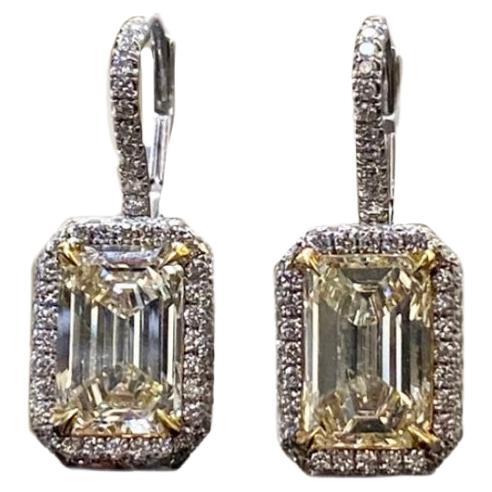 Art Deco Platinum Elongated Emerald Cut Halo Yellow Diamond Earrings For Sale