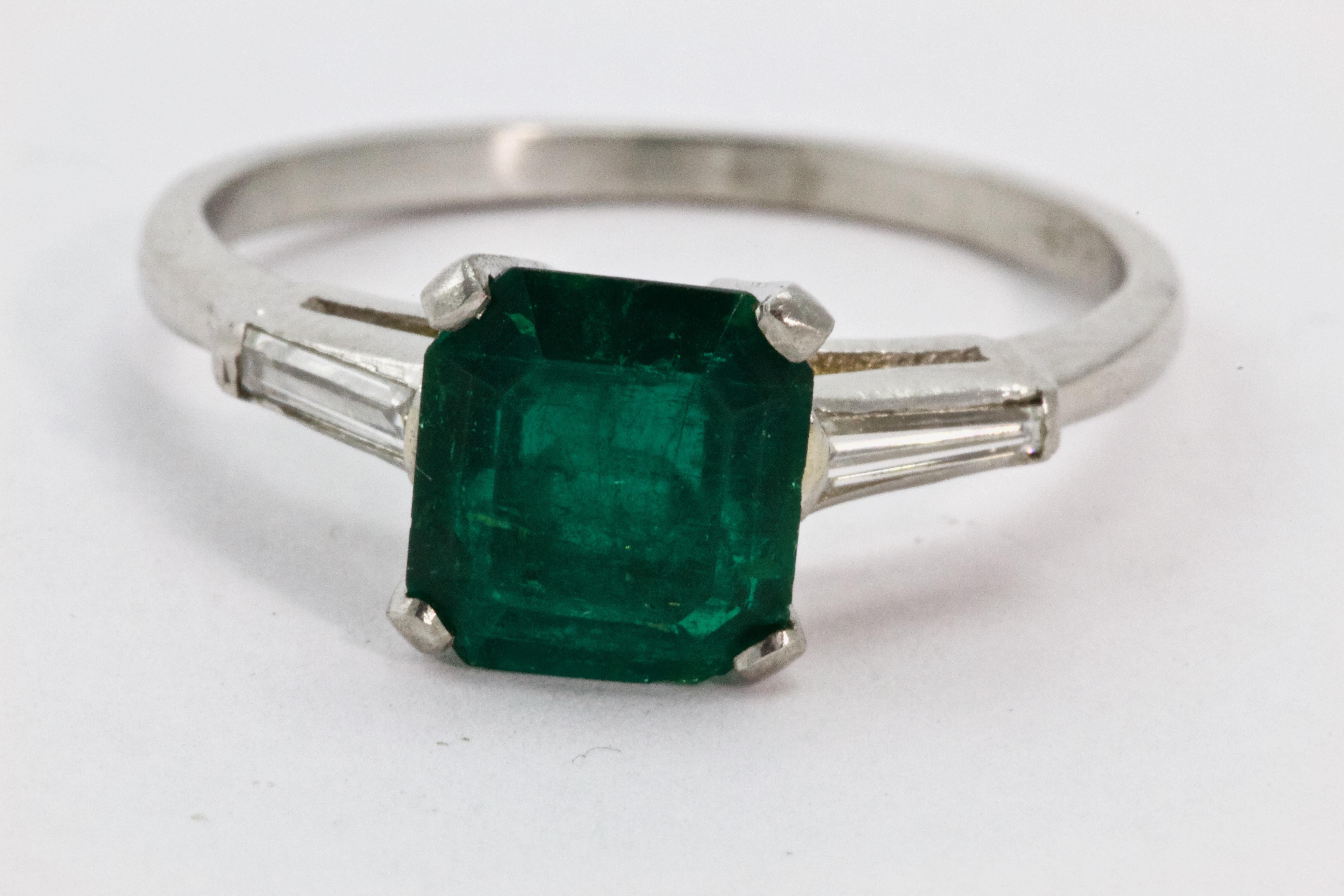 Women's Art Deco Platinum Emerald and Diamond Engagement Ring