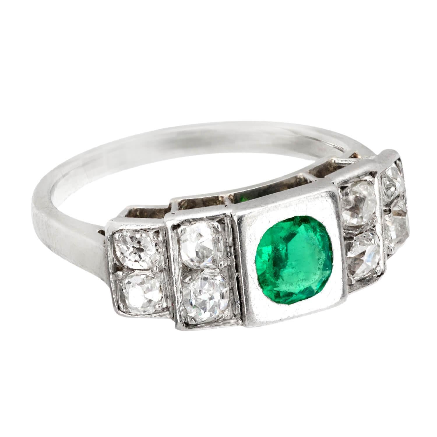 A beautiful emerald and diamond ring from the Art Deco (ca1930s) era! Crafted in platinum, this gorgeous ring has a lovely 