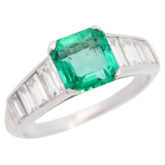 Bague Art déco en platine, émeraudes et diamants