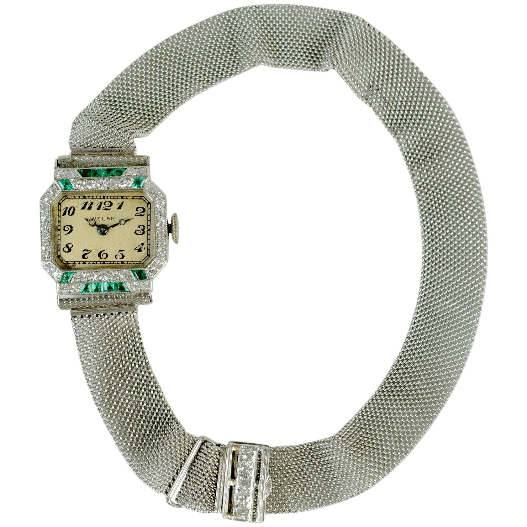 Round Cut Art Deco Platinum Emerald and Diamond Wristwatch Signed 'Welch', c1925