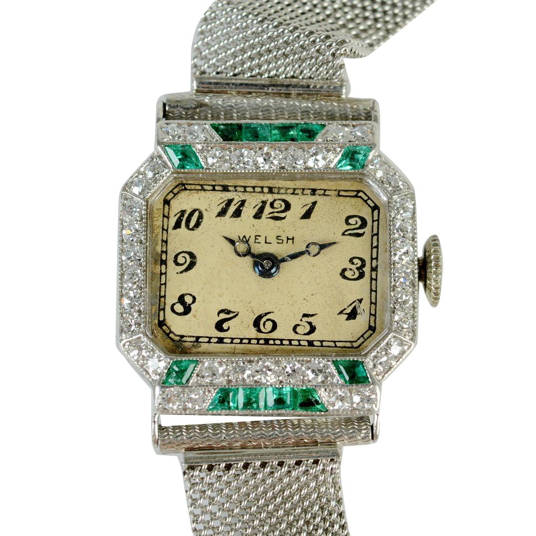 An Elegant Art Deco Platinum, Natural Emerald and Diamond Wristwatch Signed 