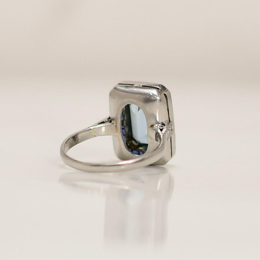 Women's Art Deco Platinum Emerald Cut Aqua With Sapphire Halo Ring For Sale