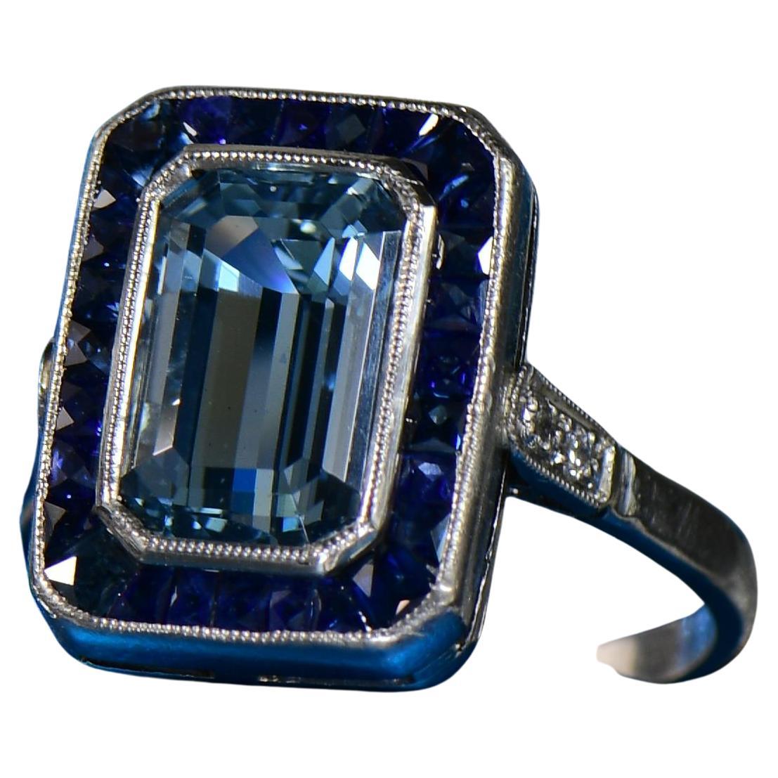 Art Deco Platinum Emerald Cut Aqua With Sapphire Halo Ring For Sale