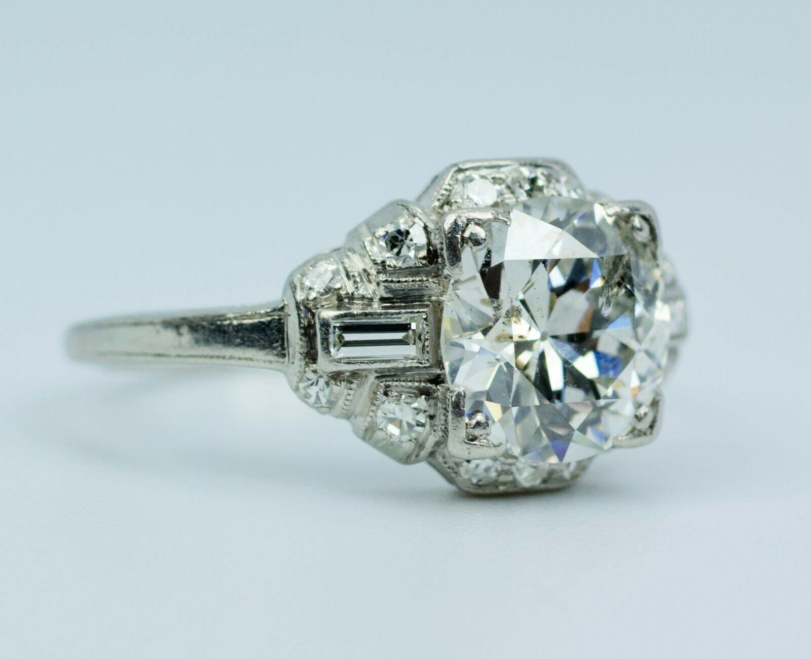 Art Deco Platinum European Cut Diamond with Baguette & Single Cut Diamond Ring In Good Condition In Montgomery, AL