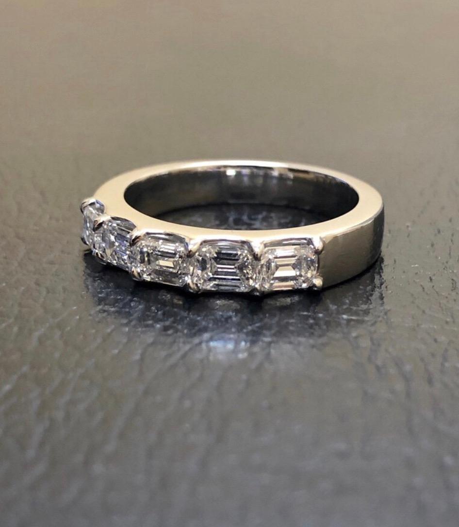 DeKara Designs Collection

Metal- 95% Platinum, 5% Iridium.

Stones- 5 Emerald Cut Diamonds, H Color VS1-VS2 Clarity 1.50 Carats.

Size- 6 3/4. FREE SIZING!!!

A truly beautiful forever classic emerald cut band that is made in platinum and Art Deco