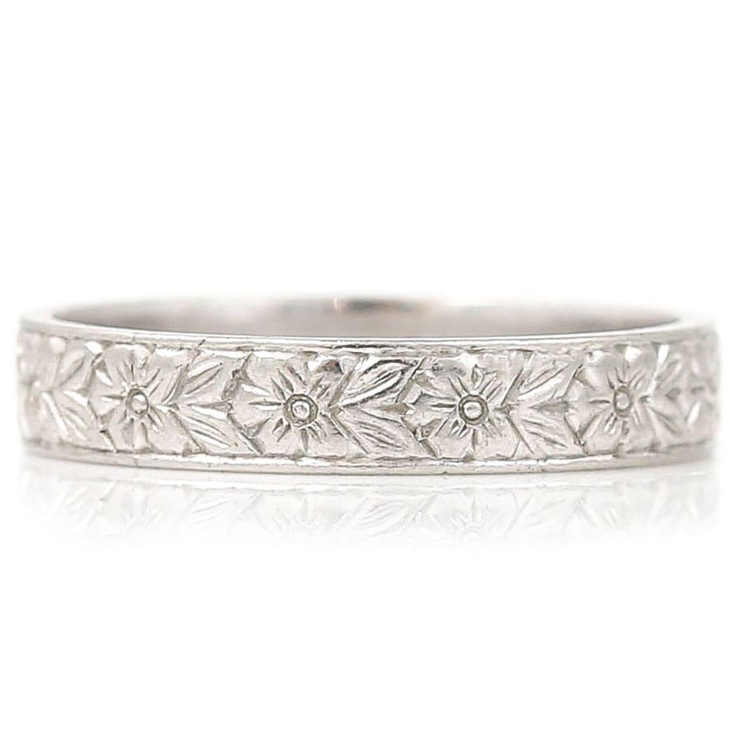 With a delightful hand engraved floral pattern this original Art Deco solid platinum band ring would make for the most perfect and unique wedding band. Dating from circa 1930 this ornately carved band ring is stamped ‘platinum’ and has a retained