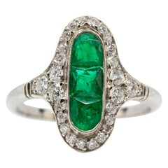 Art Deco Platinum French Cut Emeralds and Old Mine Diamonds Ring