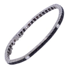 Pulsera Línea Art Déco de Platino con Ónix talla francesa y Diamantes