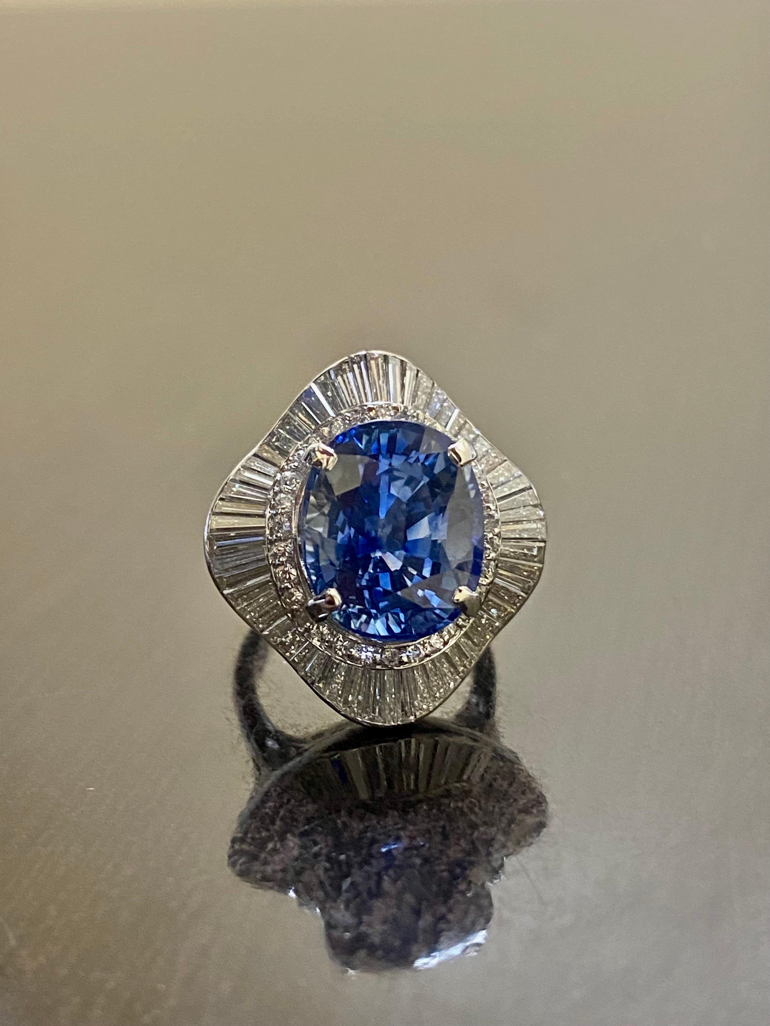 DeKara Designs Collection

Our latest design! An elegant and lustrous Oval Blue Sapphire surrounded beautifully by baguette diamonds in a halo setting.

Metal- 90% Platinum, 10% Iridium.

Stones- GIA Certified Oval Blue Sapphire 10.47 Carats, 55