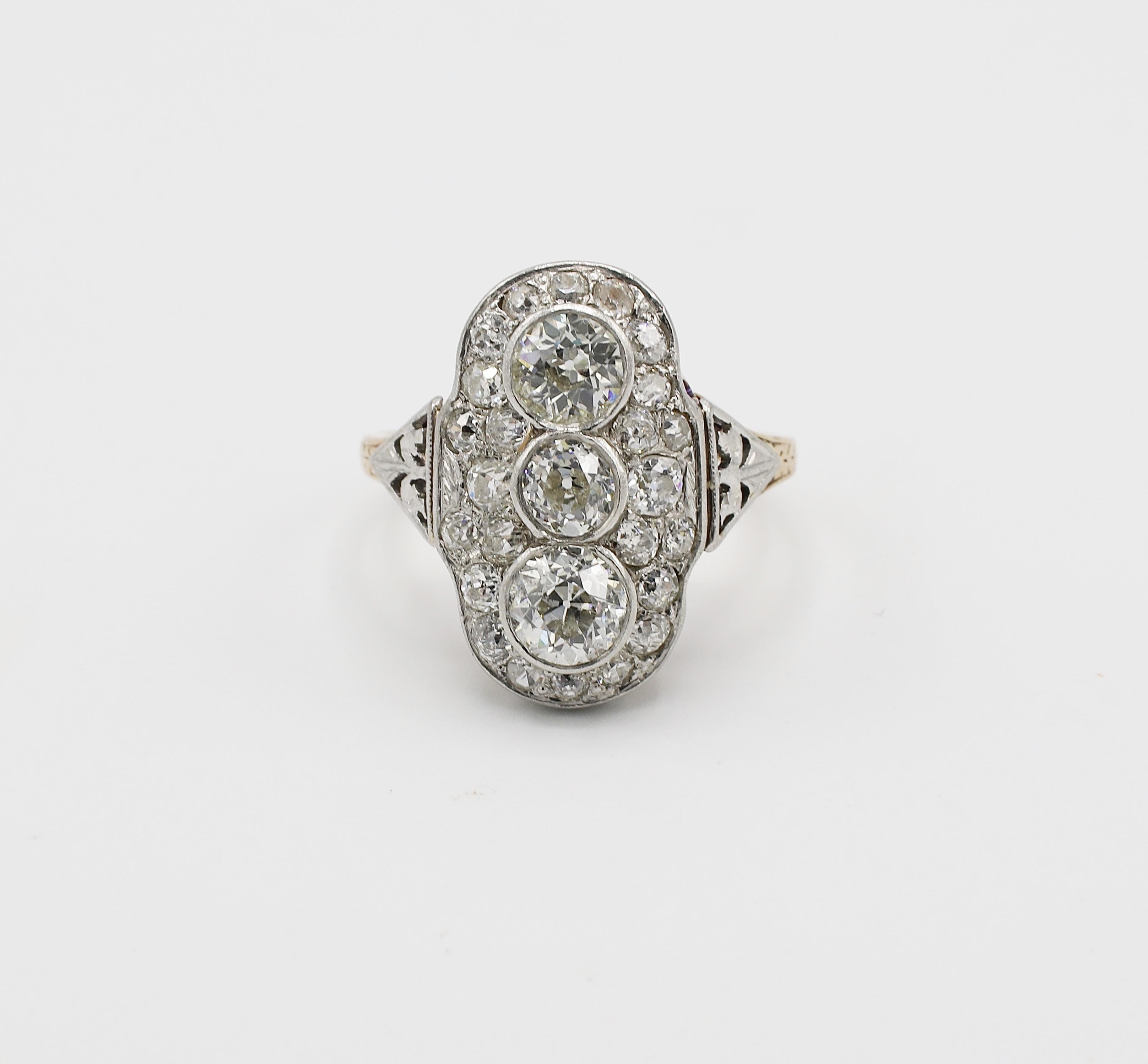 Antique Art Deco Platinum & Gold 2.25 CTW Old European Cut Diamond Cocktail Ring Size 7.75
Metal: 14k yellow gold & platinum 
Weight: 5.89 grams
Diamonds: Approx. 2.25 CTW I-J  SI 
Size: 7.75 (US)
Top of ring measures 20 x 12.5mm

