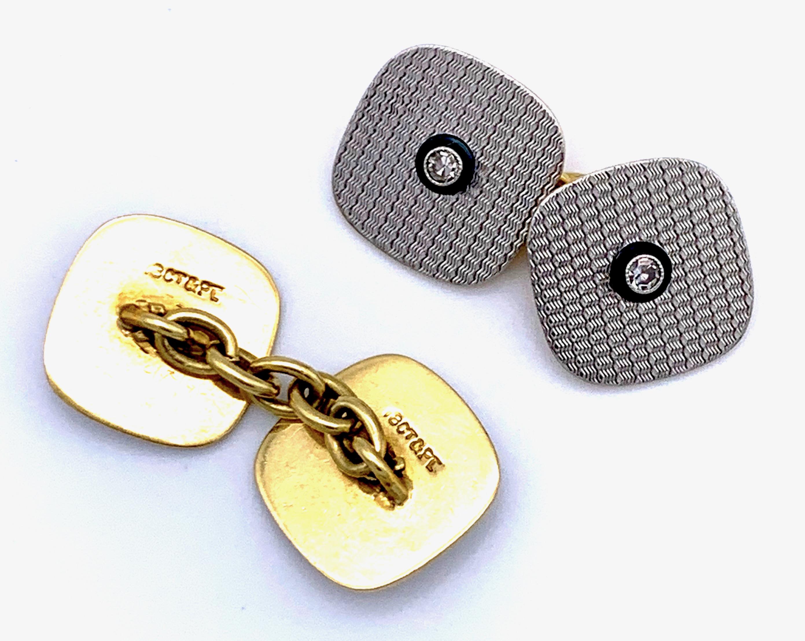 This pair of highly elegant and stylish cufflinks are made out of platinum and 18k gold. The links are made with gold backed and with an elegant pattern finely engraved platinum squares with rounded corners. They are conected by golden chains. Each