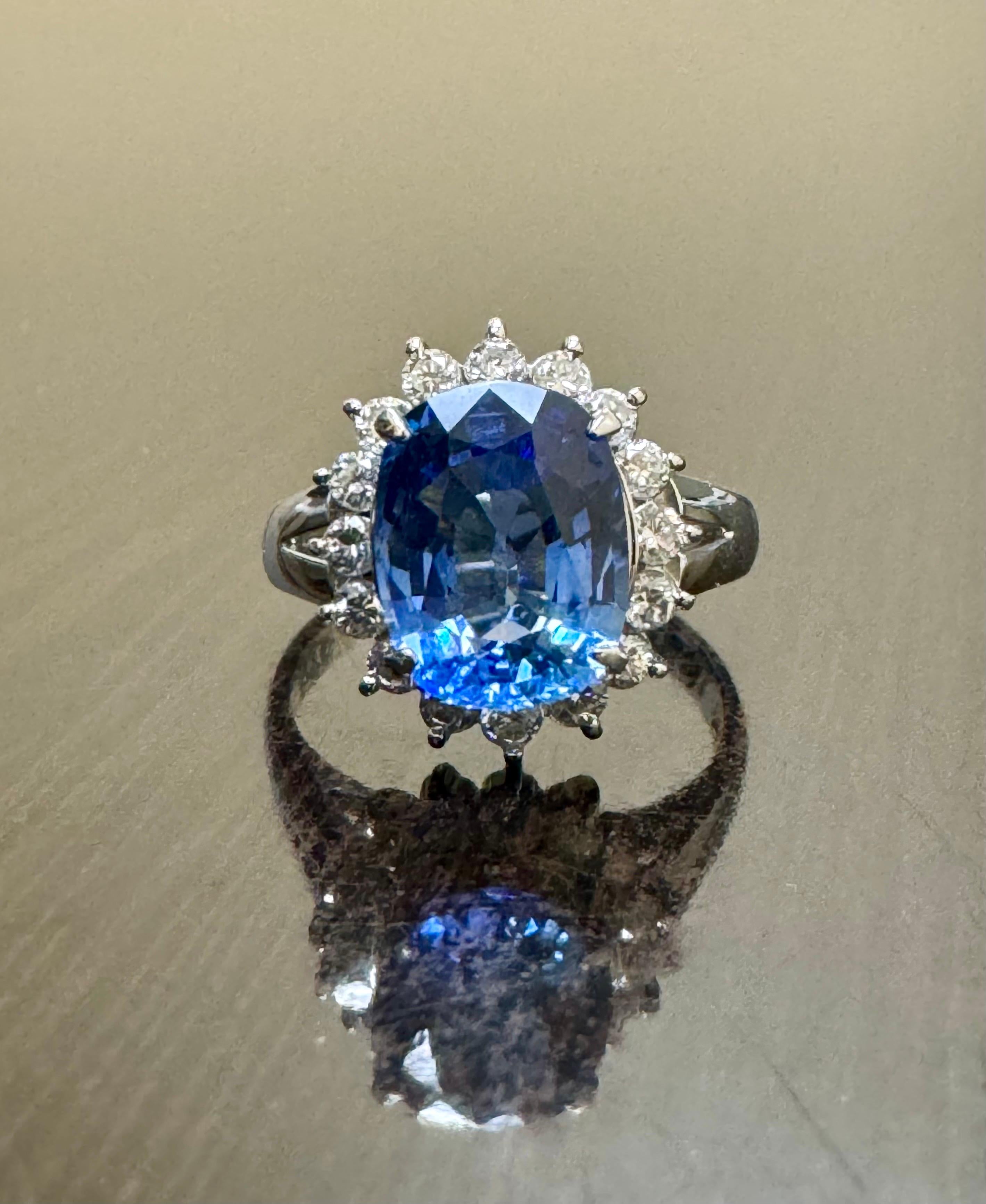 DeKara Designs Collection

Metal- 90% Platinum, 10% Iridium.  

Stones- Genuine Sri Lanka Oval Blue Sapphire 3.75 Carats, 16 Round Diamonds F-G Color VS2 Clarity 0.54 Carats.

Size- 6 3/4.  FREE SIZING!!!!

Handmade Platinum Sapphire and Diamond
