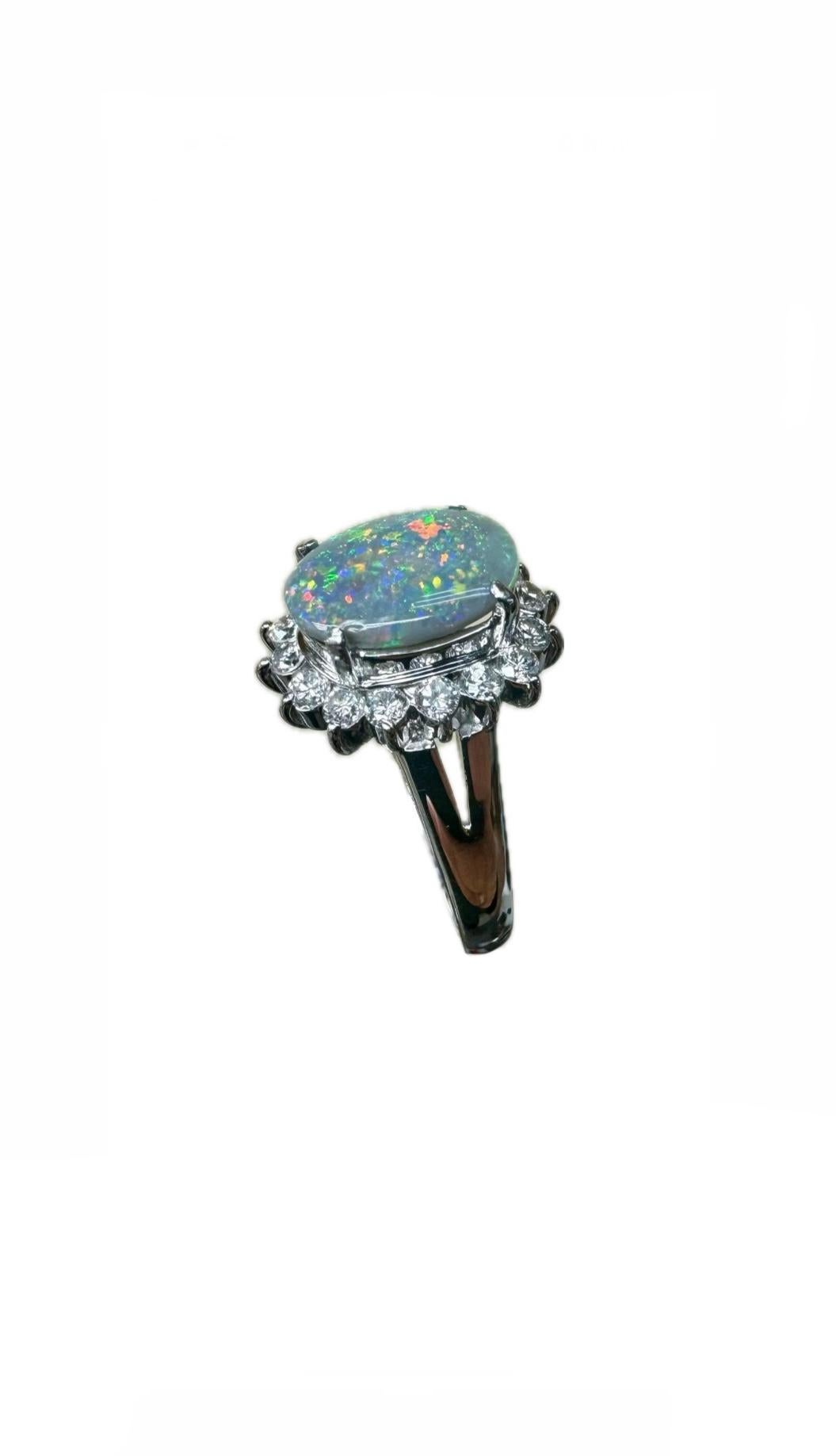 Women's or Men's Art Deco Platinum Halo Diamond Oval Black Opal Engagement Ring For Sale