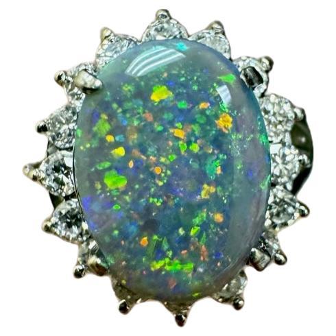 Verlobungsring aus Platin mit Platin-Halo und Diamant im Art déco-Stil, ovaler schwarzer Opal