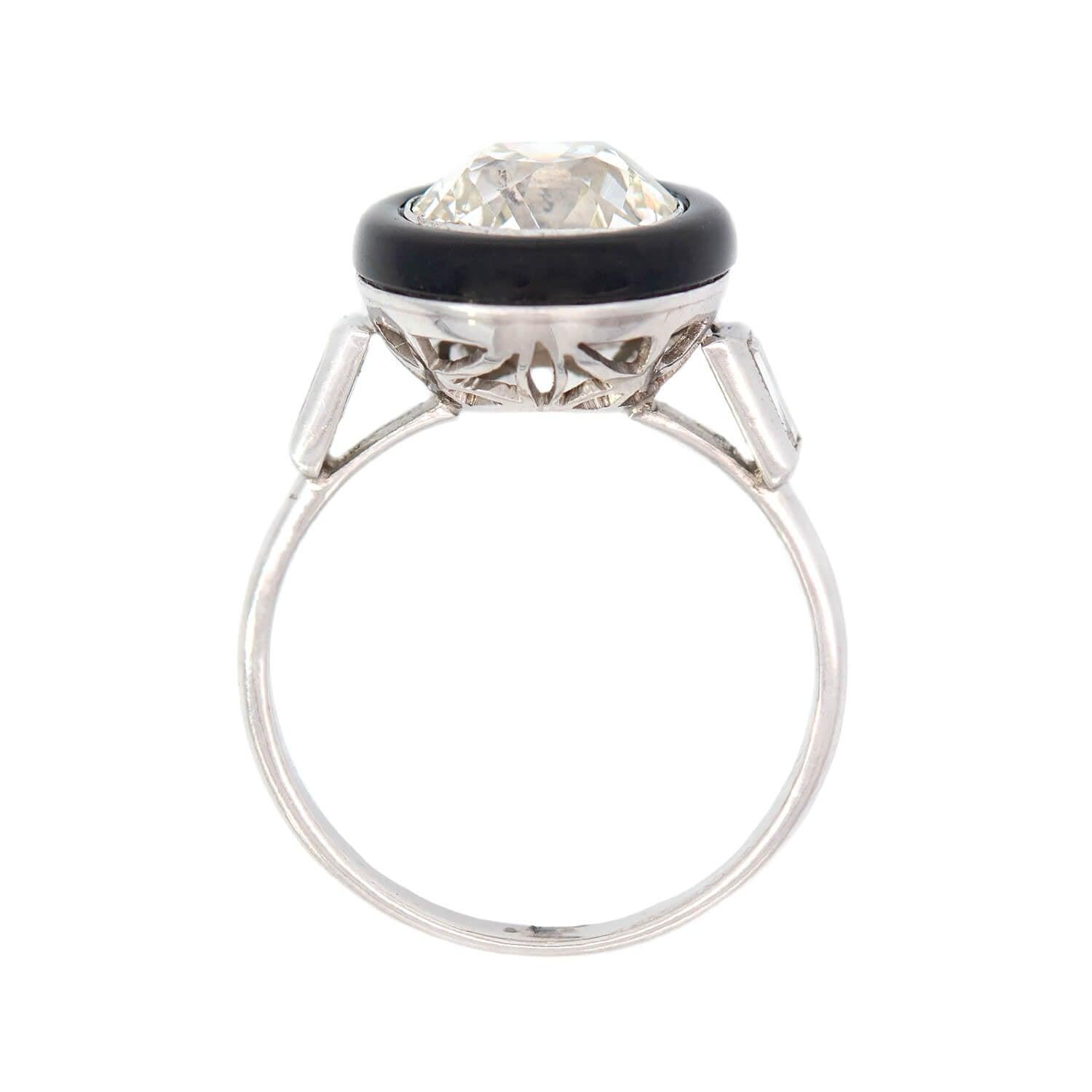 Art Deco Platinum Halo Onyx and Diamond Ring In Good Condition For Sale In Narberth, PA