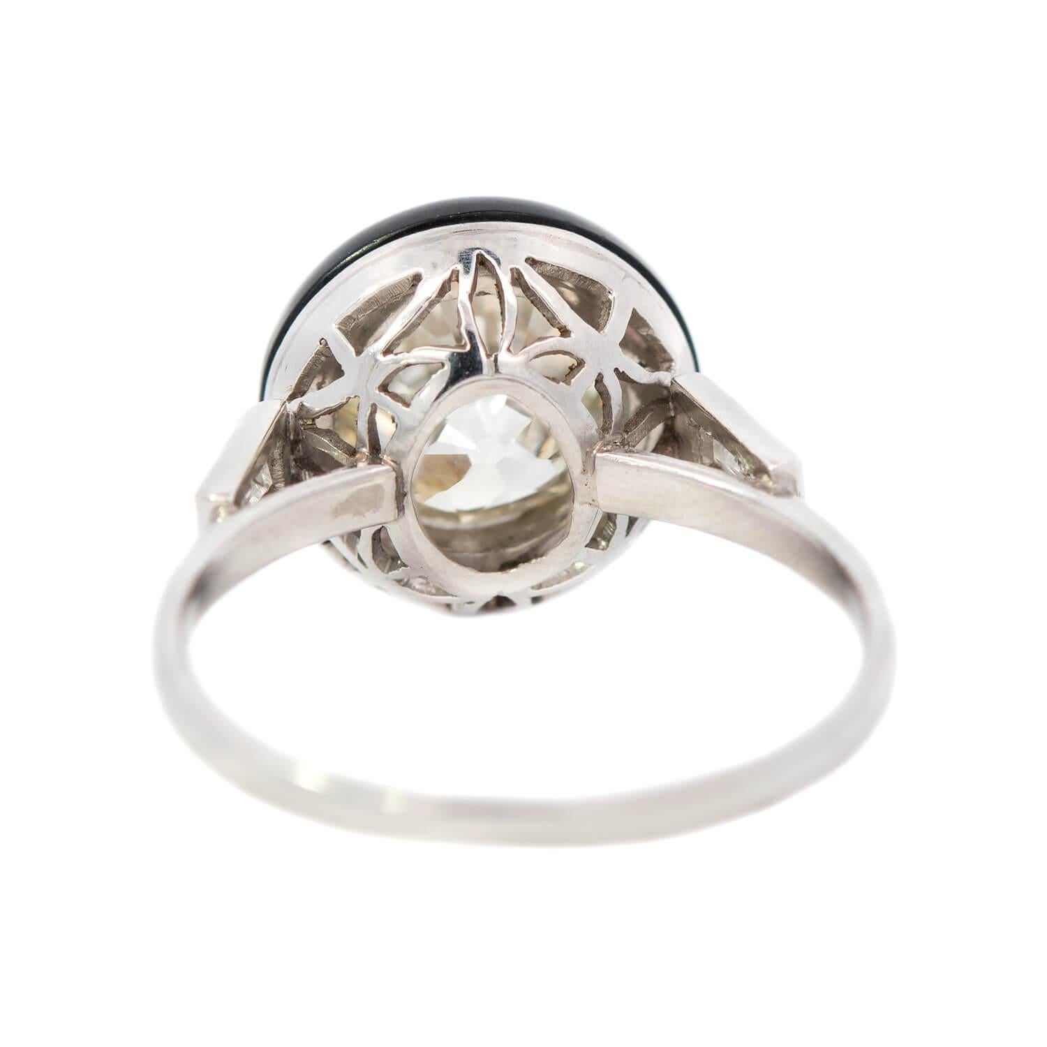Women's or Men's Art Deco Platinum Halo Onyx and Diamond Ring For Sale