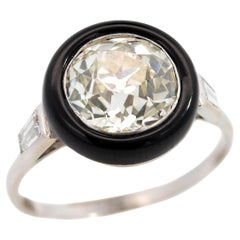 Vintage Art Deco Platinum Halo Onyx and Diamond Ring