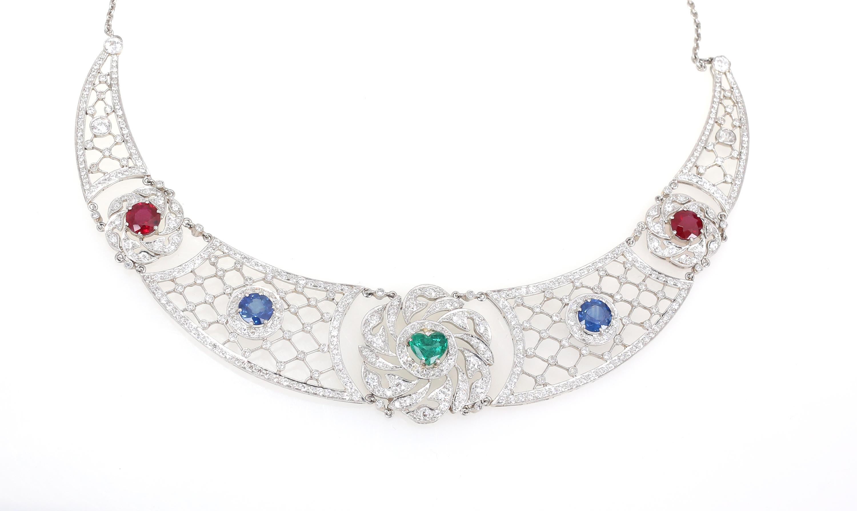 Heart Cut Art Deco Platinum Heart-Shaped Emerald Sapphires Rubies Diamond Necklace, 1920 For Sale