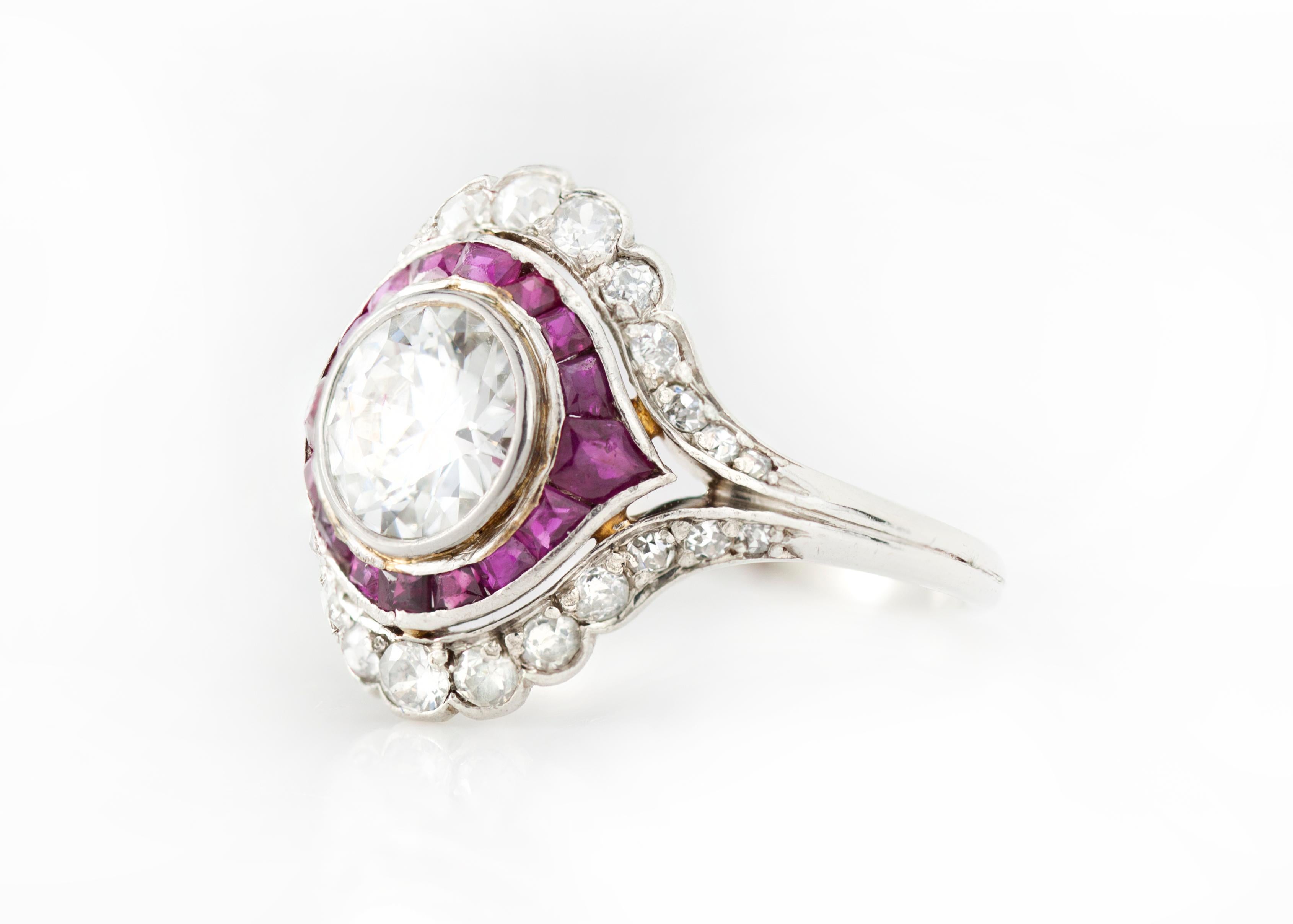 Art Deco platinum ladies ring with 1.50 ct diamond and rubies
Circa 1930's
Tested positive for platinum

Dimensions - 
Weight : 4.5 grams
Finger Size (UK) = O (US) = 7 1/2 (EU) = 55 1/4
Size : 2.2 x 2 x 1.8 cm

Diamonds - 
Cut: Round
Number of