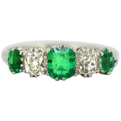Art Deco Platinum Ladies Ring with Emerald and Old Cut Diamonds, circa 1920s