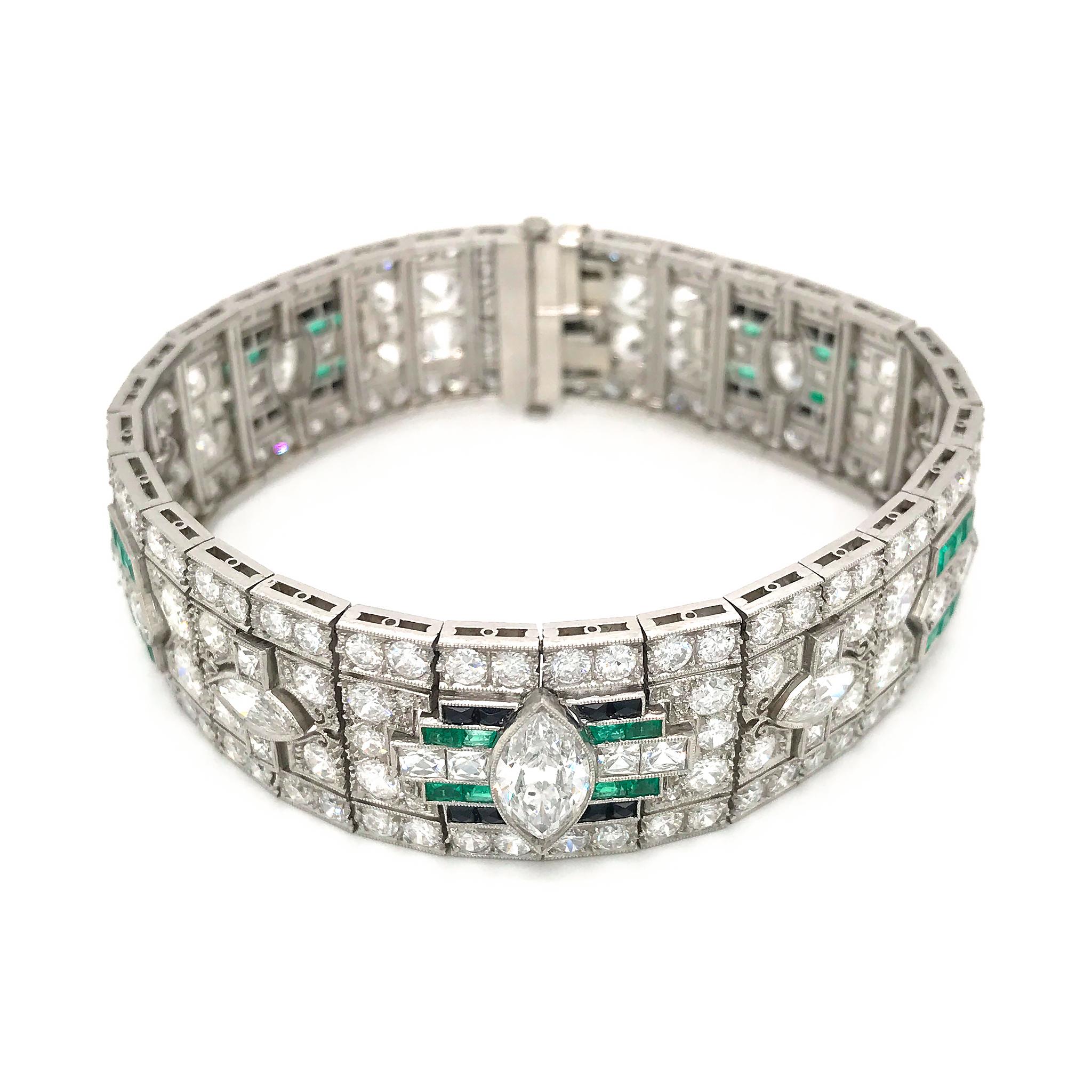 Art Deco Platinum Magnificent Emerald and Diamond 1917 to 1925 Bracelet

An exceptional Art Deco creation, this platinum bracelet features vibrant green emerald gemstones, onyx, in an exquisite pattern of 7 brilliant marquise and 218 old euro round