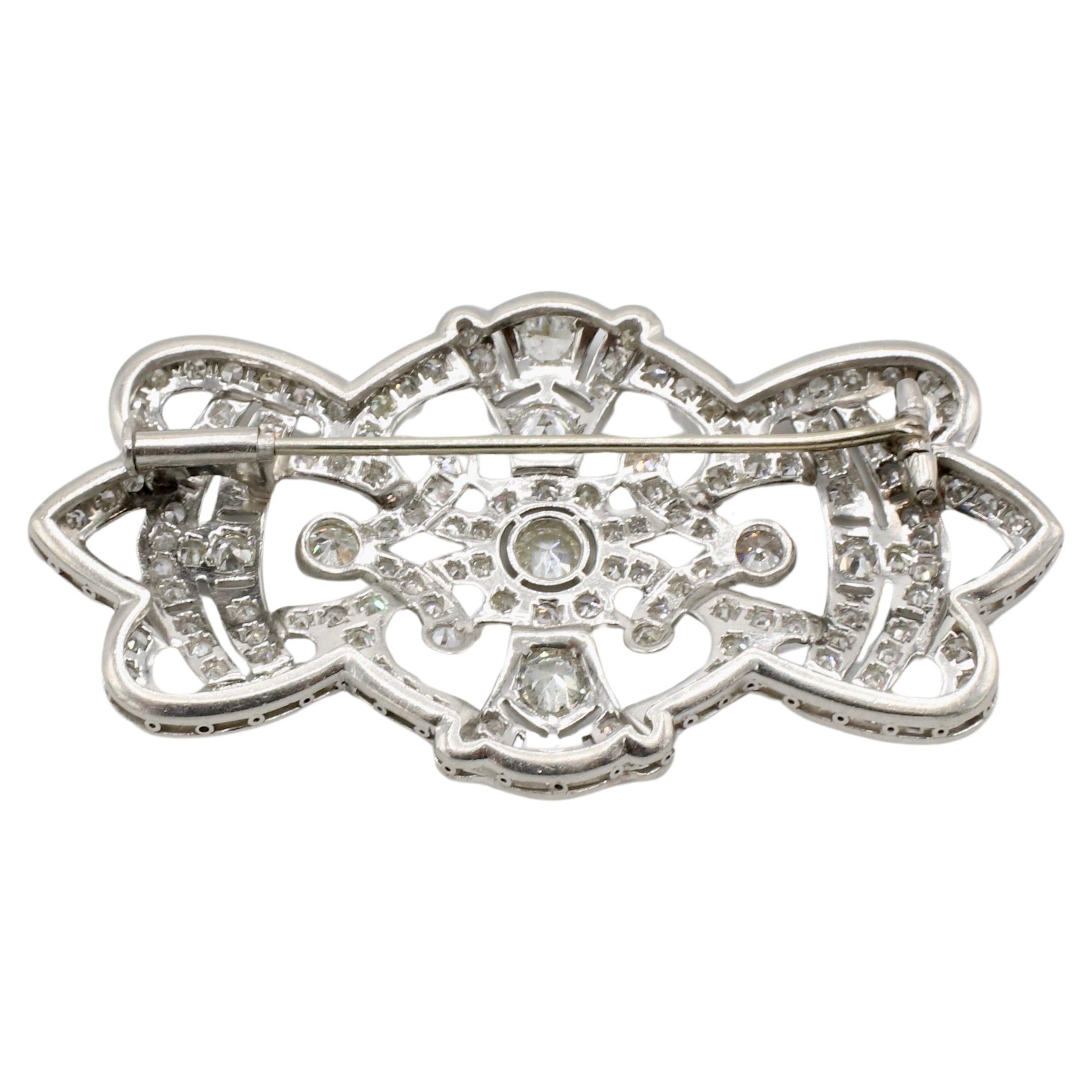 Art Deco Platinum Natural Diamond Brooch Pin 
Metal: Platinum
Weight: 18.75 grams
Dimensions: 60 x 32mm
Diamonds: Approx. 4.00 carats old European cut and single cut round diamonds H-I VS-SI1
Note: No signatures or hallmarks


