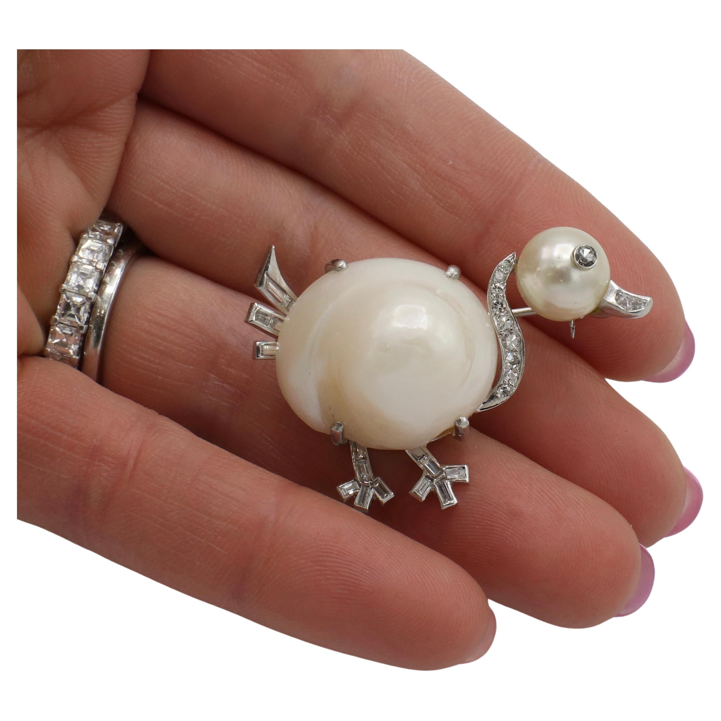 Art Deco Platinum Natural Diamond & Pearl Duck Pin Brooch 
Metal: Platinum
Diamonds: Single cut round and baguette natural diamonds approx. .75 CTW G-H VS
Weight: 17.9 grams
Dimensions: 41 x 28mm
Pearls: 20x 23mm, 9.5mm
