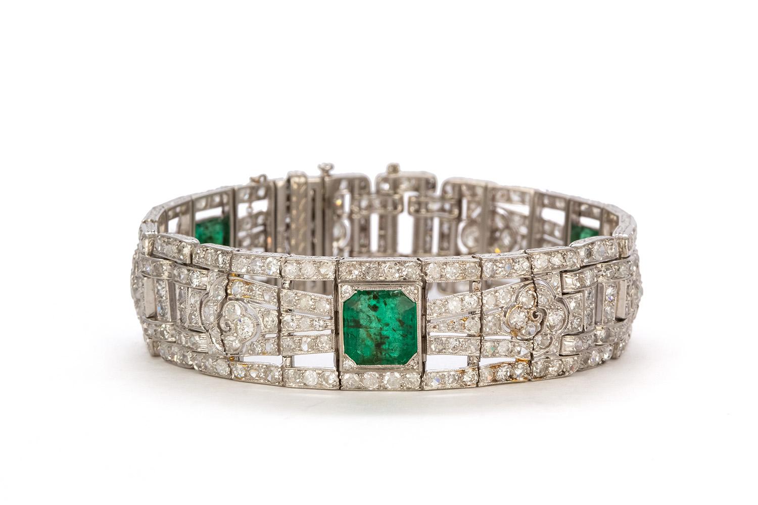 We are pleased to offer this Art Deco Platinum Natural Emerald & Diamond Bracelet. This stunning bracelet feature an estimated 3.50ctw natural emerald accented by approximately 12.00ctw round brilliant cut diamonds all set in a vintage art deco