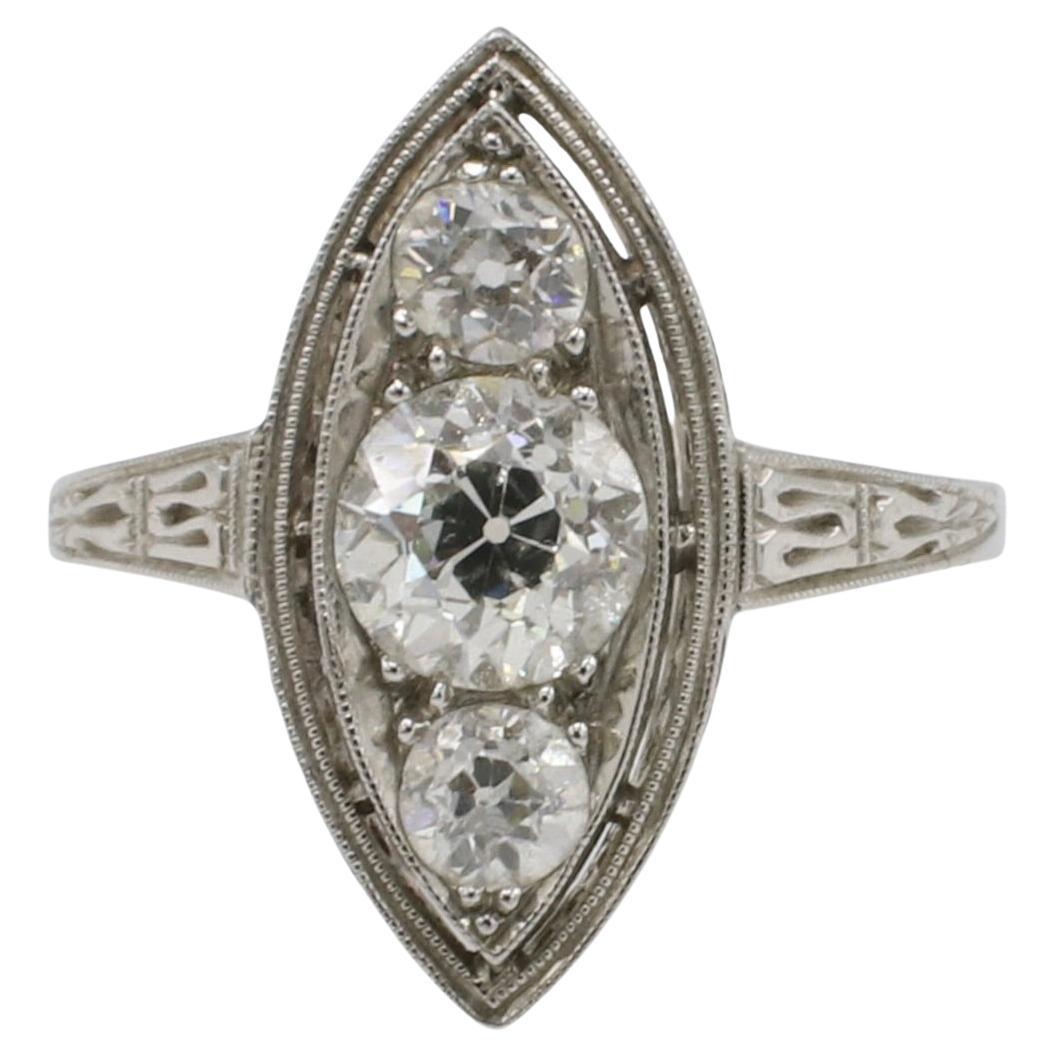 Art Deco Platinum Natural Three-Stone Diamond European Cut Navette Ring For Sale