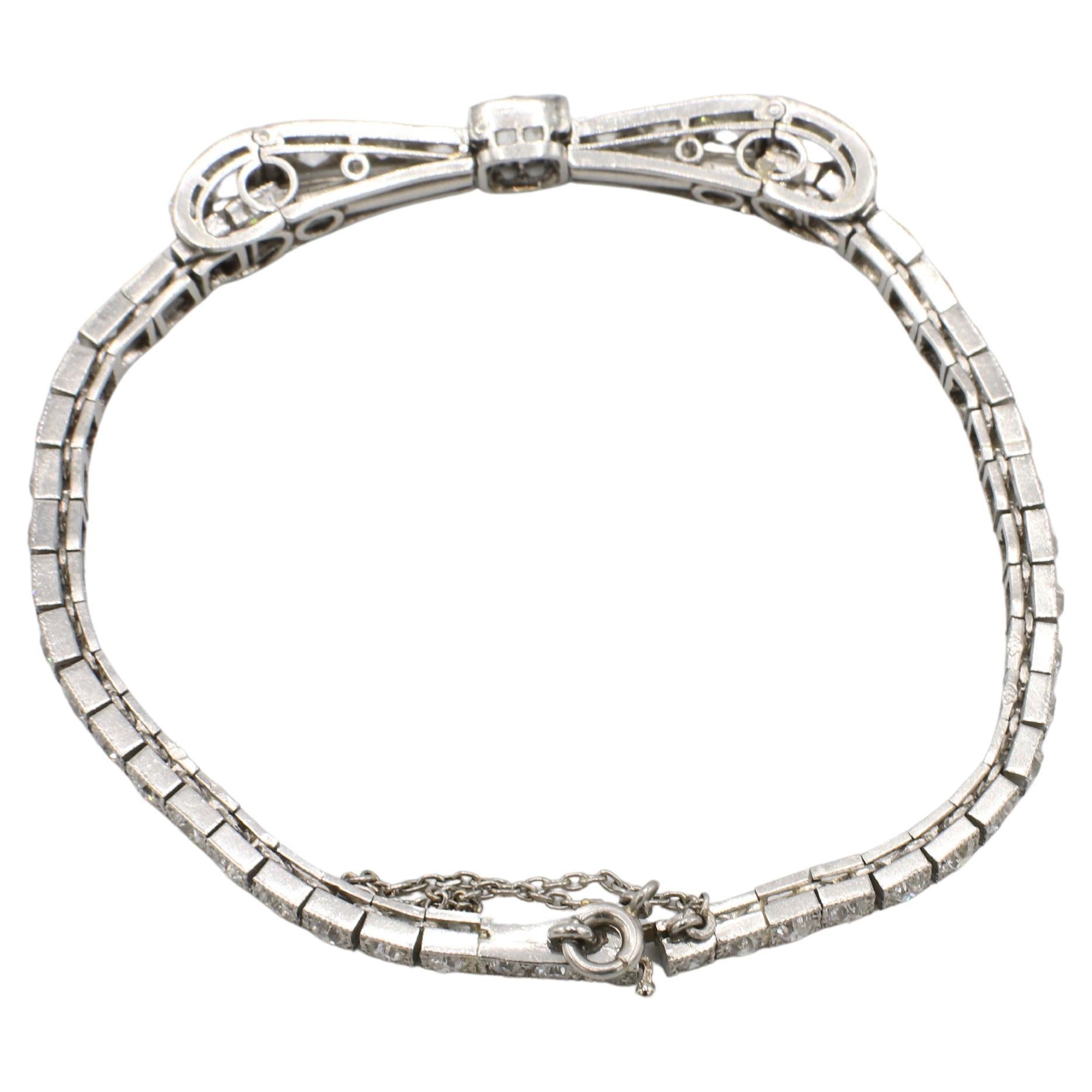 Art Deco Platinum Old European 3.50 Carat Natural Diamond Ribbon Bow Bracelet In Excellent Condition In  Baltimore, MD