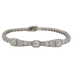 Art Deco Platinum Old European 3.50 Carat Natural Diamond Ribbon Bow Bracelet