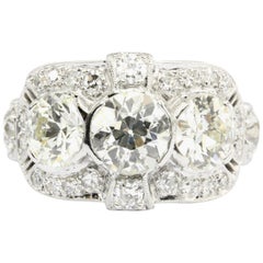 Art Deco Platinum Old European Cut 3-Stone Diamond Engagement Ring, circa 1920s