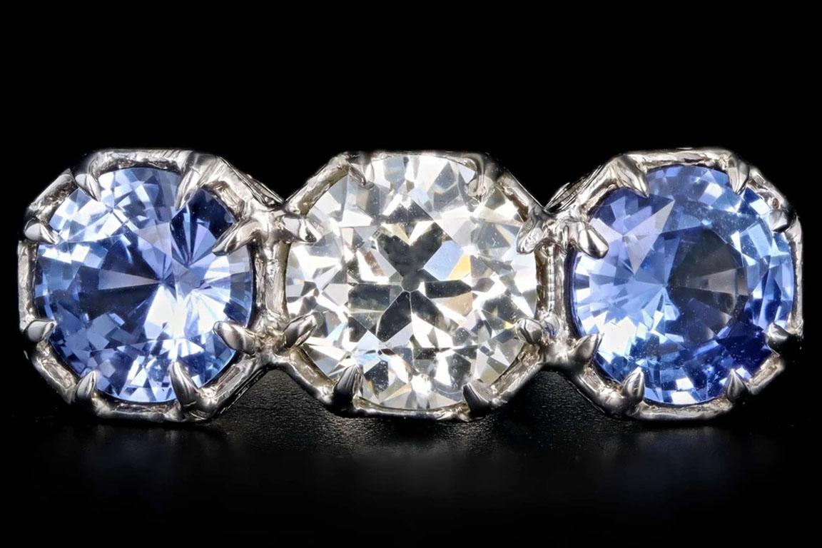 Art deco platinum old european cut diamond and sapphire three stone ring

Era: Art Deco
Composition: Platinum 
Primary stone: Old european cut diamond
Carat weight: Approximately 1.43 carats
Color/ Clarity: K / VS1
GIA Report number: