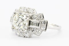 Art Deco Platinum Old European Cut Diamond Cluster Engagement Ring, circa 1920s
