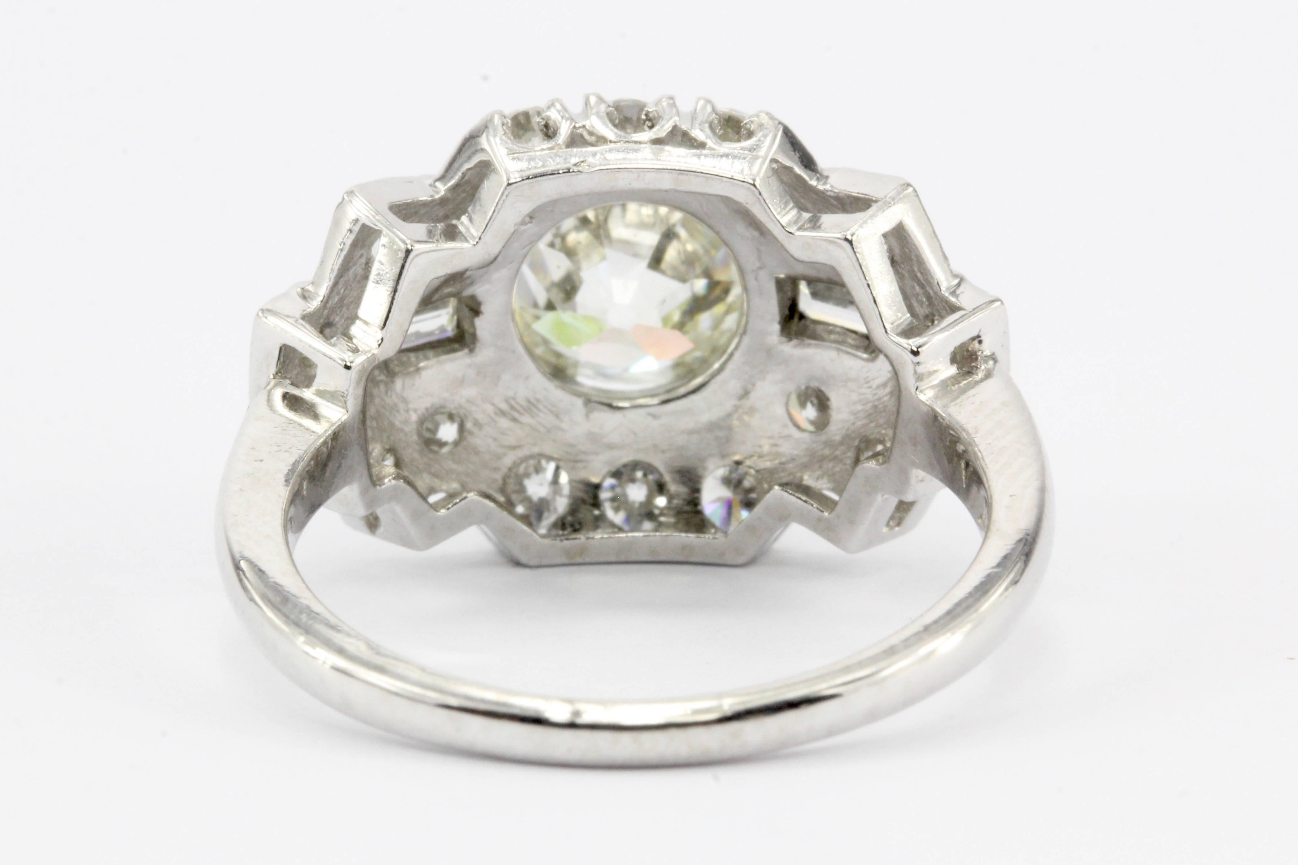 Women's Art Deco Platinum Old European Cut Diamond Cluster Engagement Ring, circa 1920s
