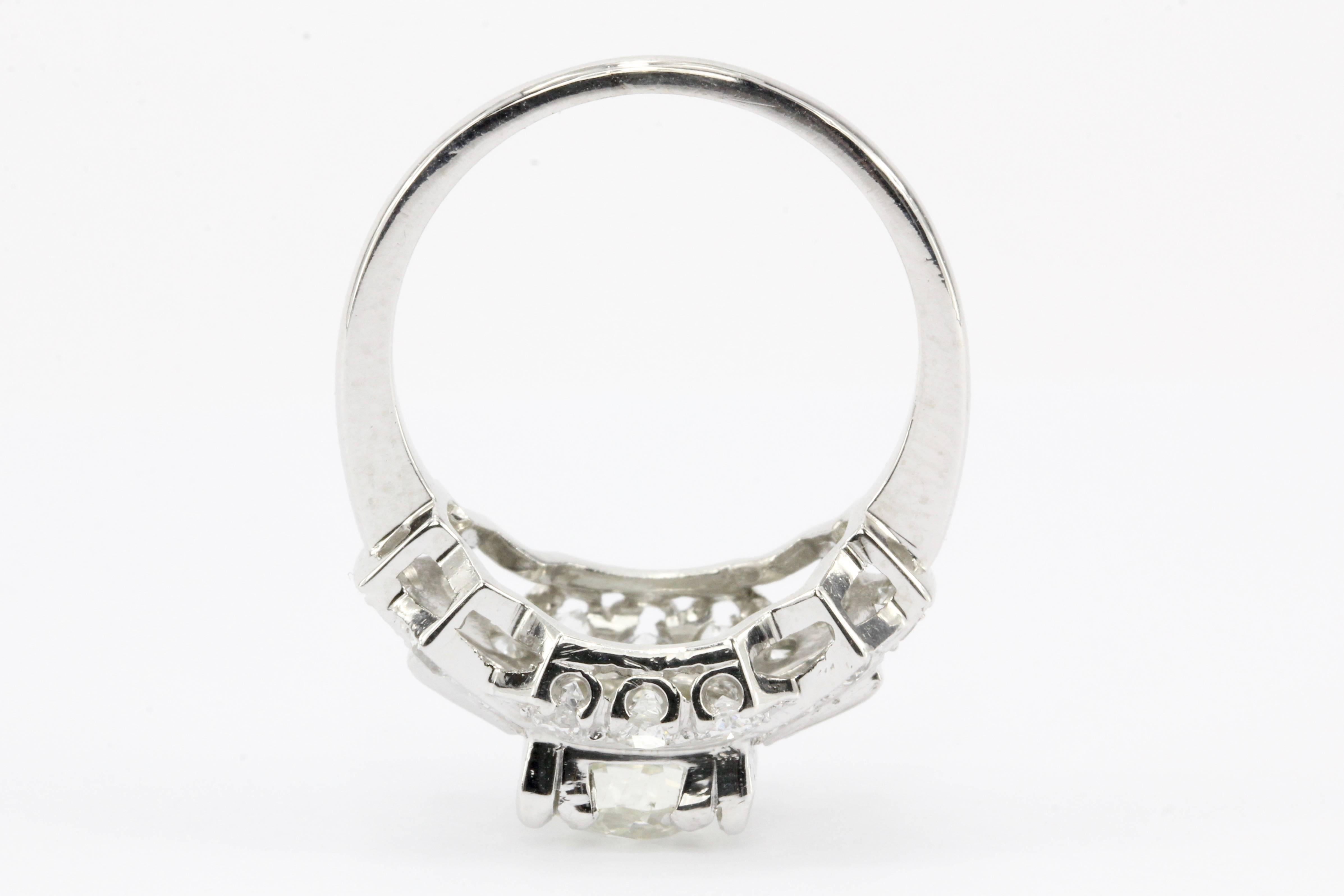 Art Deco Platinum Old European Cut Diamond Cluster Engagement Ring, circa 1920s 1