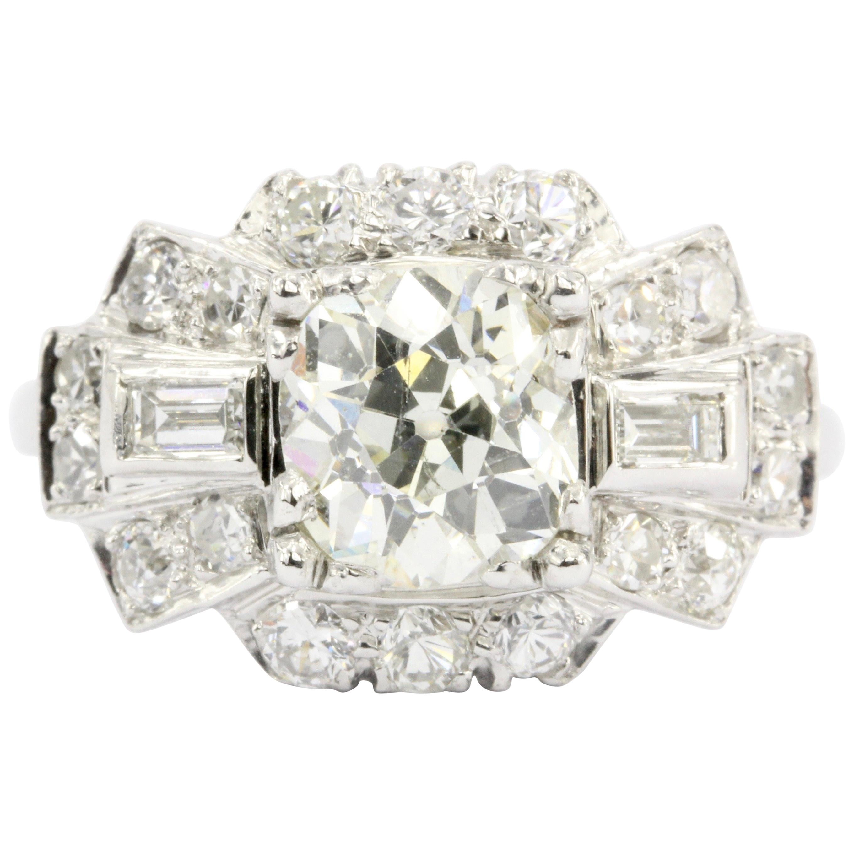 Art Deco Platinum Old European Cut Diamond Cluster Engagement Ring, circa 1920s