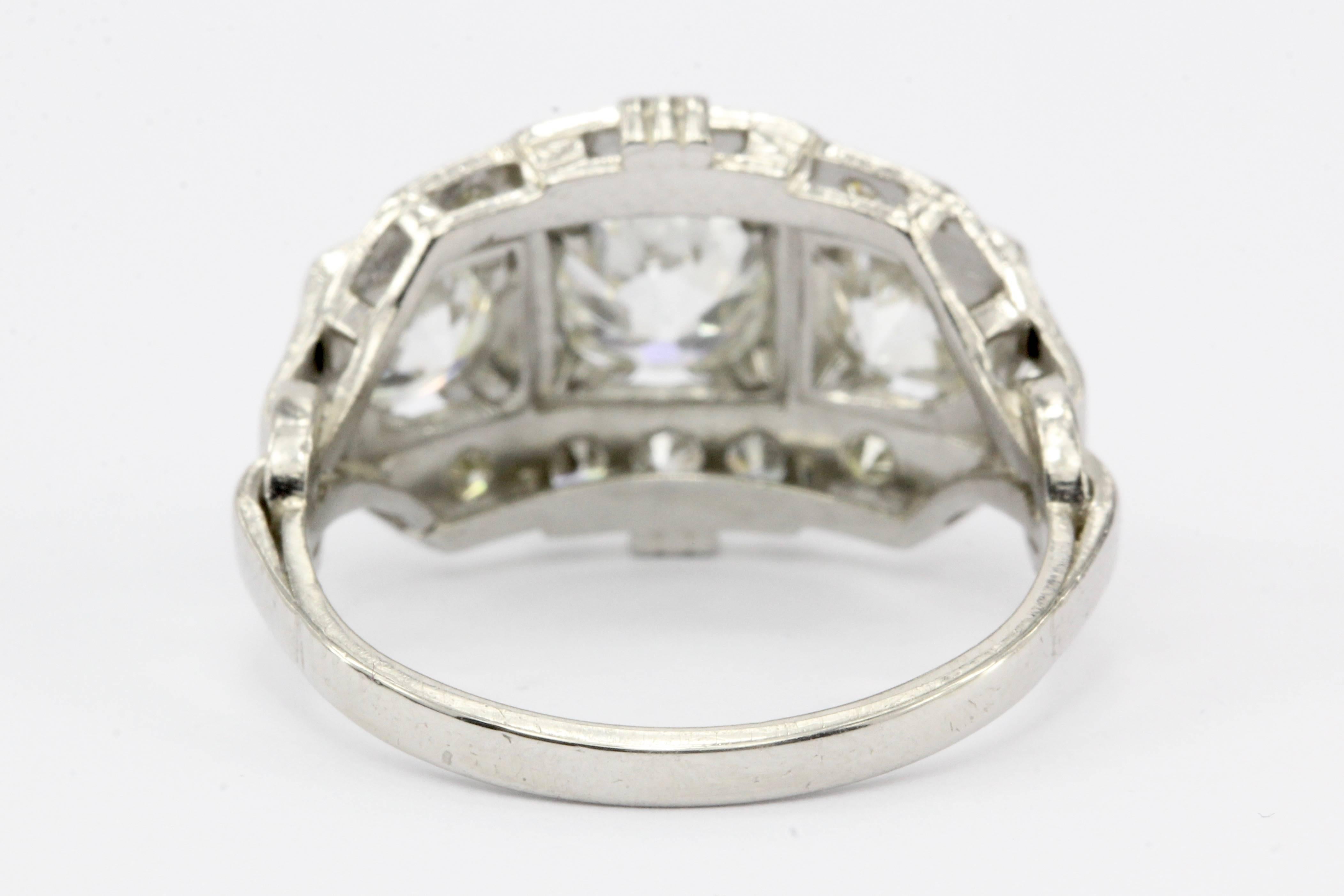 Women's Art Deco Platinum Old European Cut Diamond Three-Stone Cluster Ring, circa 1920s