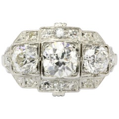Art Deco Platinum Old European Cut Diamond Three-Stone Cluster Ring, circa 1920s