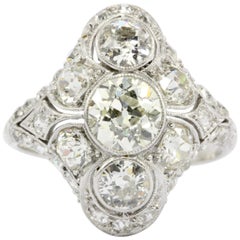 Art Deco Platinum Old European Cut Diamond Three-Stone Cluster Ring, circa 1920s