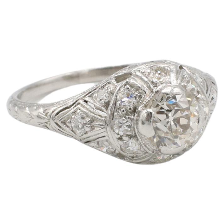 Art Deco Platinum Old European Cut Natural Diamond Dome Cocktail Ring 
Metal: Platinum
Weight: 3.72 grams
Size: 7 (US)
Height: 7.5mm
Diamonds: Center stone is approx. .75 carat old European cut J VS. Accent diamonds are approx. .15 CTW H-I VS single