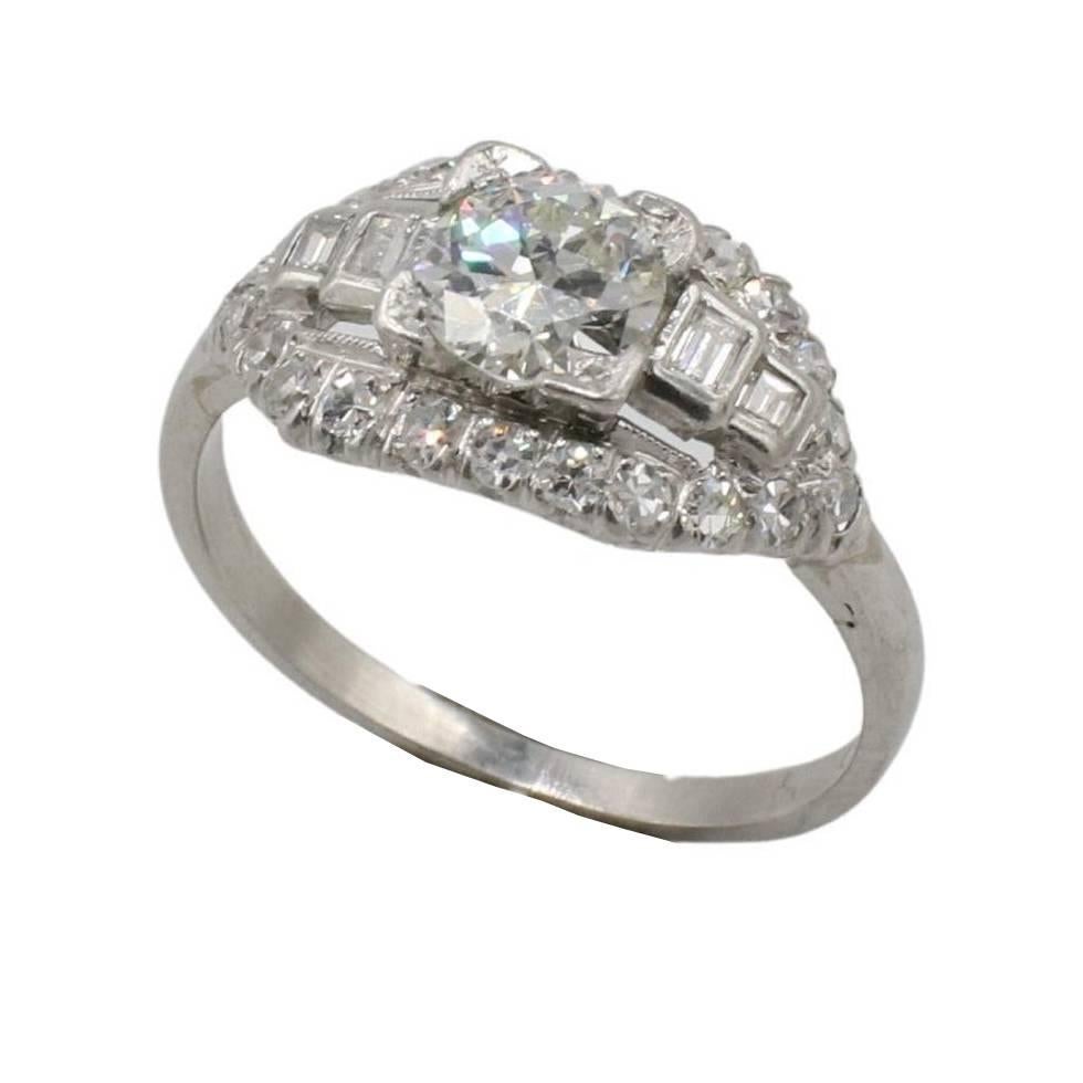 Art Deco Platinum Old European Cut Natural Diamond Engagement Ring 
Metal: Platinum
Weight: 2.94 grams
Diamonds: Center diamond is approx. 0.60 carat I SI2 natural old European cut diamond
Accent diamonds: Approx. .30 CTW H-I VS single cut and