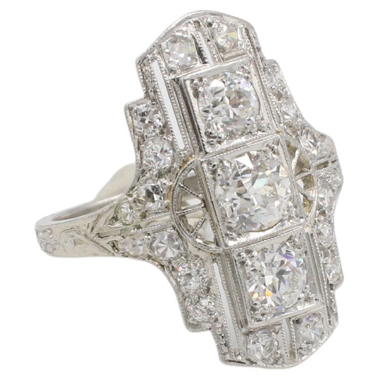 Art Deco Platinum Old European Cut Natural Diamond Navette Cocktail Ring 
Metal: Platinum
Weight: 5.11 grams
Diamonds: Center diamond is approx. 0.50 carat old European cut H VS natural diamond
Accent diamonds: Approx. 1.00 CTW old European cut H-I