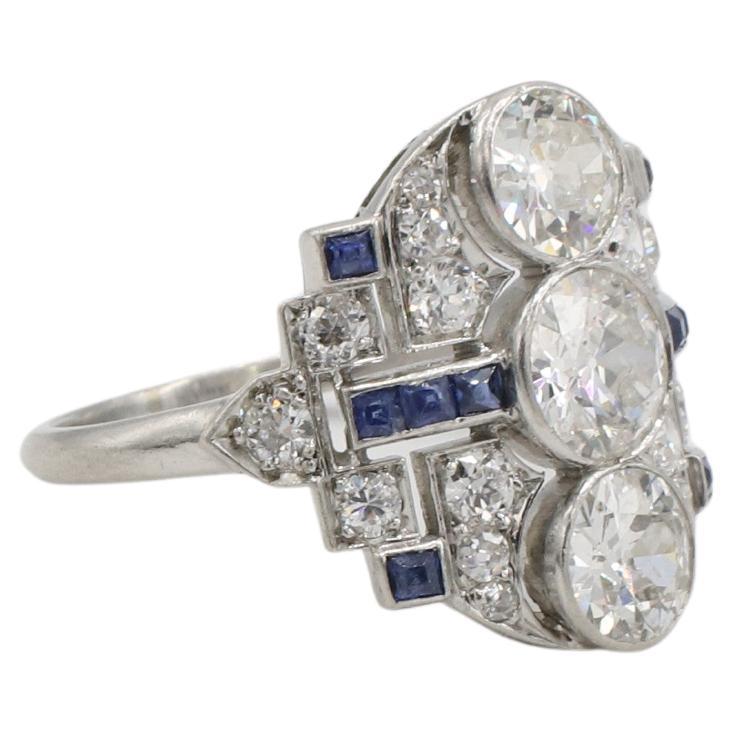 Art Deco Platinum Old European Cut Natural Diamond & Sapphire Cocktail Navette Ring 
Metal: Platinum
Weight: 4.65 grams
Diamonds: 3 old European cut natural diamonds approx. 2.00 CTW H-I SI1-SI2
Accent diamonds: Approx. .40 CTW G-H VS single and old